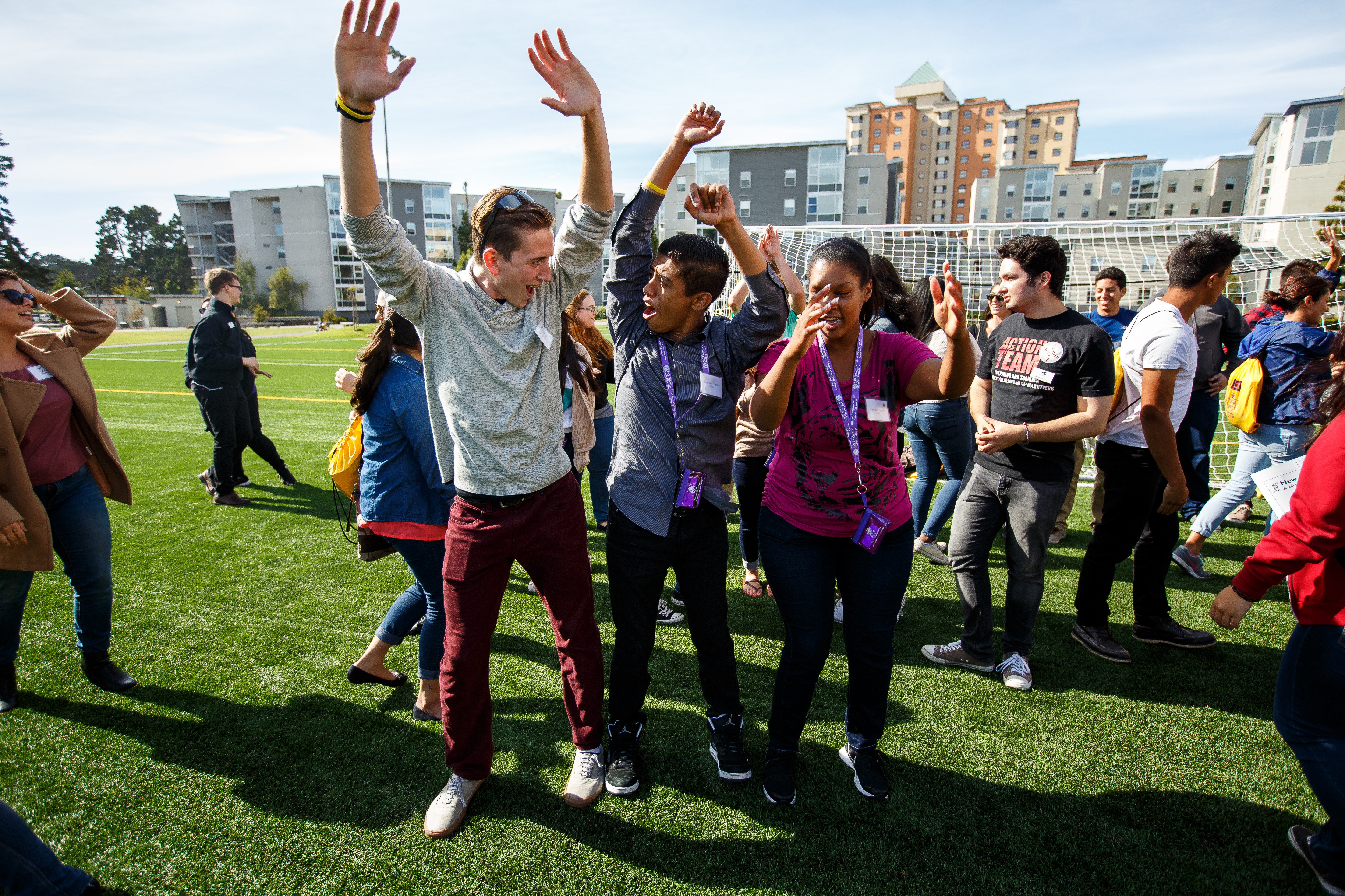 Students engaged in an activity outdoors on the West Campus Green